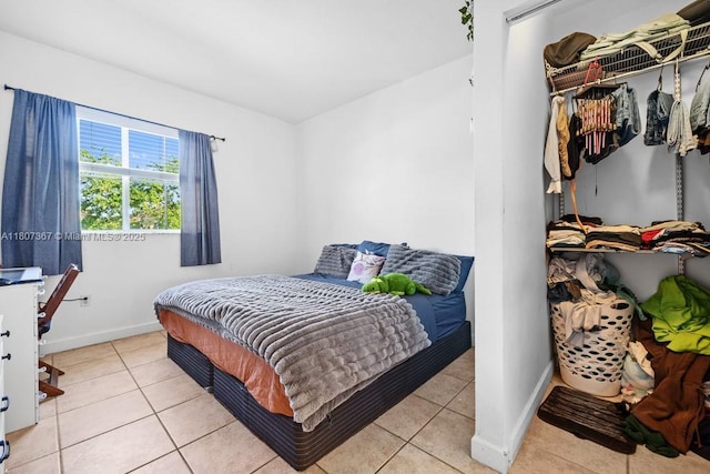 15490 SW 18th Ln, Miami, FL 33185 - bedroom with light tile patterned floors and baseboards