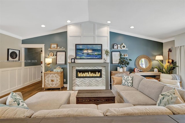 7850 NW 53rd Ct, Lauderhill, FL 33351 - living area featuring wood finished floors, vaulted ceiling, a large fireplace, crown molding, and recessed lighting