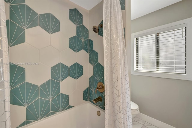7850 NW 53rd Ct, Lauderhill, FL 33351 - full bathroom with marble finish flooring, shower / bath combo with shower curtain, toilet, and baseboards