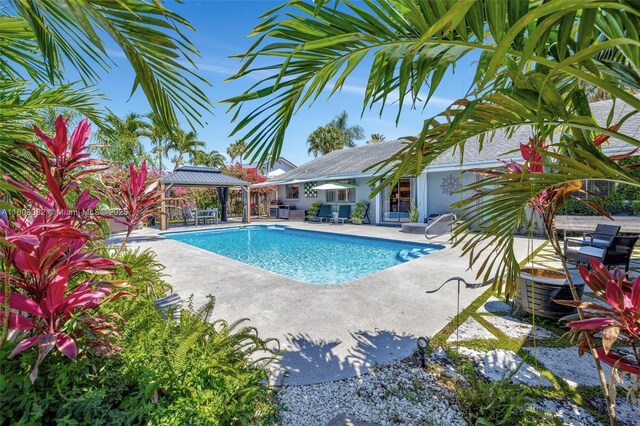 7850 NW 53rd Ct, Lauderhill, FL 33351 - swimming pool with a gazebo and a patio area