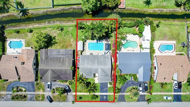 7850 NW 53rd Ct, Lauderhill, FL 33351 - aerial view of property and surrounding area with a pool and property boundaries highlighted