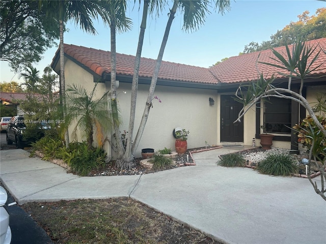15210 SW 48th Ter Unit H-83, Miami, FL 33185 - view of front of property with a tiled roof and stucco siding