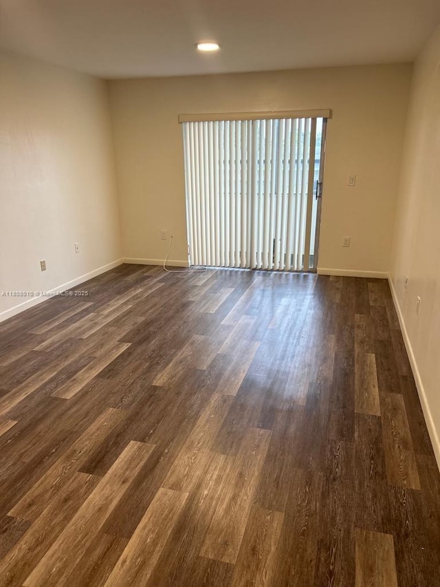 16750 NE 10th Ave Unit 225, North Miami Beach, FL 33162 - spare room with dark wood-style floors, baseboards, and recessed lighting