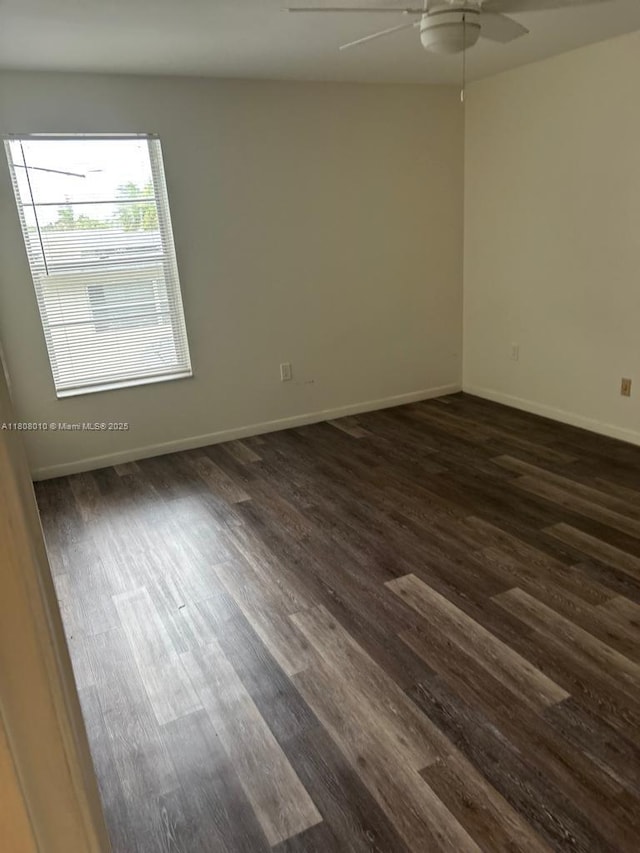 16750 NE 10th Ave Unit 225, North Miami Beach, FL 33162 - spare room with ceiling fan and dark wood-style flooring
