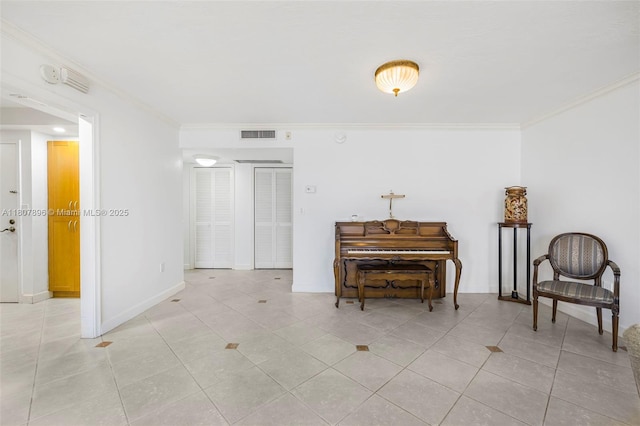 625 Biltmore Way Unit 301, Coral Gables, FL 33134 - sitting room featuring ornamental molding, light tile patterned floors, and baseboards