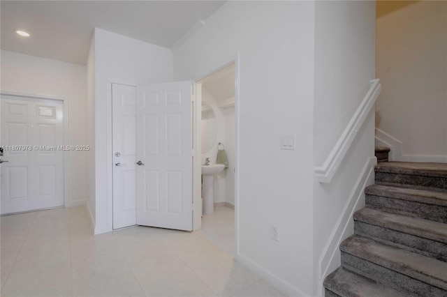 10260 SW 228th Ter Unit 10260, Miami, FL 33190 - stairs featuring tile patterned floors, recessed lighting, and baseboards