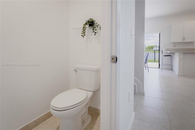 10260 SW 228th Ter Unit 10260, Miami, FL 33190 - bathroom featuring toilet, tile patterned floors, and baseboards