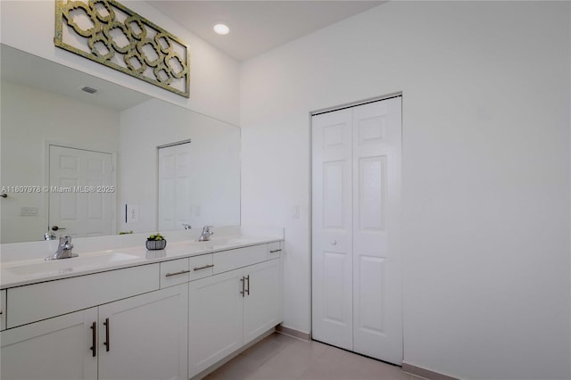 10260 SW 228th Ter Unit 10260, Miami, FL 33190 - full bath featuring a closet, double vanity, baseboards, and recessed lighting