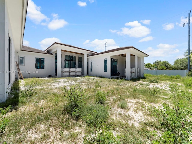 8275 SW 93rd St, Miami, FL 33156 - back of property with stucco siding