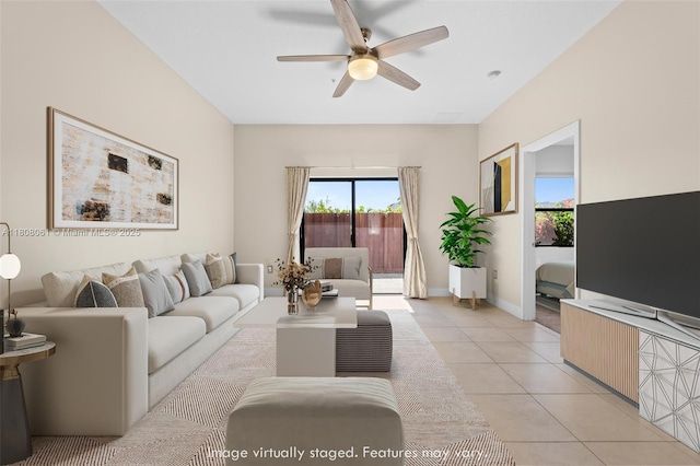 7825 NW 104th Ave Unit 4, Doral, FL 33178 - living area with a ceiling fan, light tile patterned flooring, and baseboards