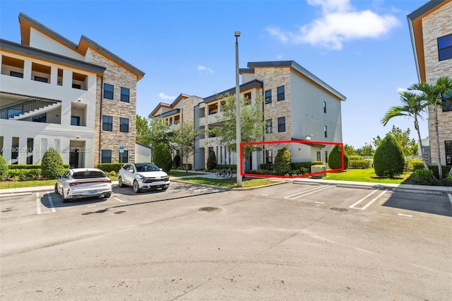7825 NW 104th Ave Unit 4, Doral, FL 33178 - view of building exterior with uncovered parking