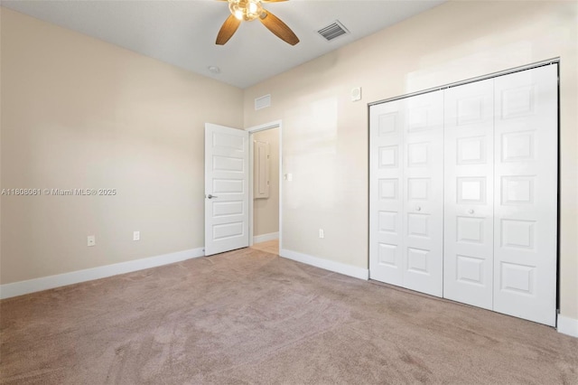 7825 NW 104th Ave Unit 4, Doral, FL 33178 - unfurnished bedroom with carpet floors, a closet, baseboards, and ceiling fan