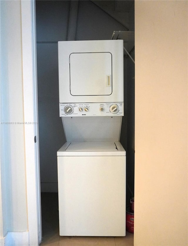 1050 Brickell Ave Unit 202, Miami, FL 33131 - washroom with stacked washing machine and dryer