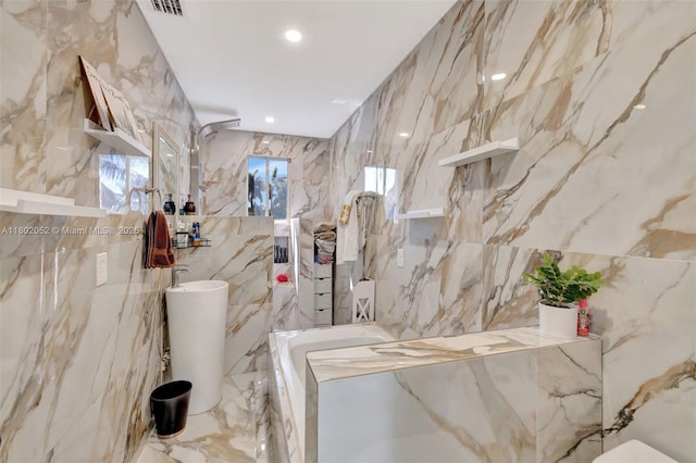 1317 Majesty Ter, Weston, FL 33327 - full bathroom featuring tile walls, a marble finish shower, marble tiled floors, a bath, and recessed lighting