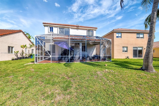 1317 Majesty Ter, Weston, FL 33327 - rear view of house featuring a lawn, glass enclosure, and stucco siding