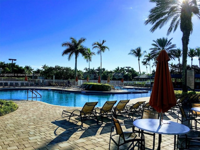 1317 Majesty Ter, Weston, FL 33327 - community pool with a patio