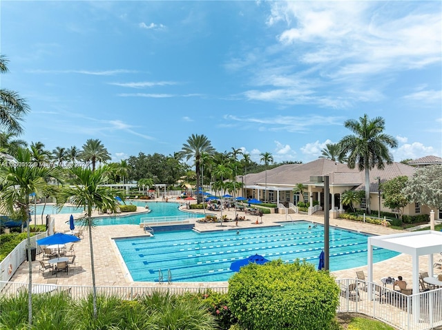 1317 Majesty Ter, Weston, FL 33327 - community pool featuring a patio area