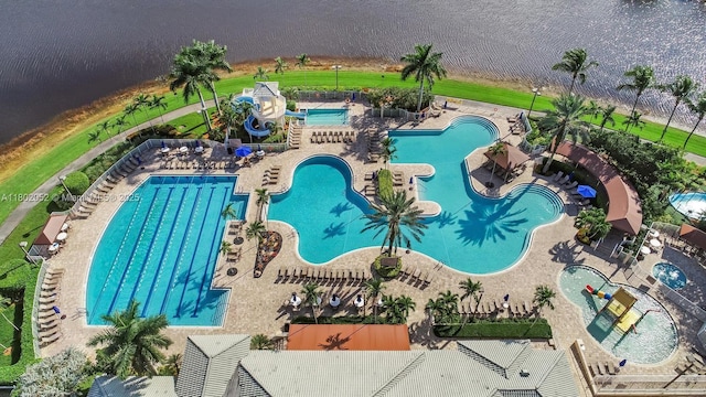 1317 Majesty Ter, Weston, FL 33327 - community pool with a water slide and a water play area
