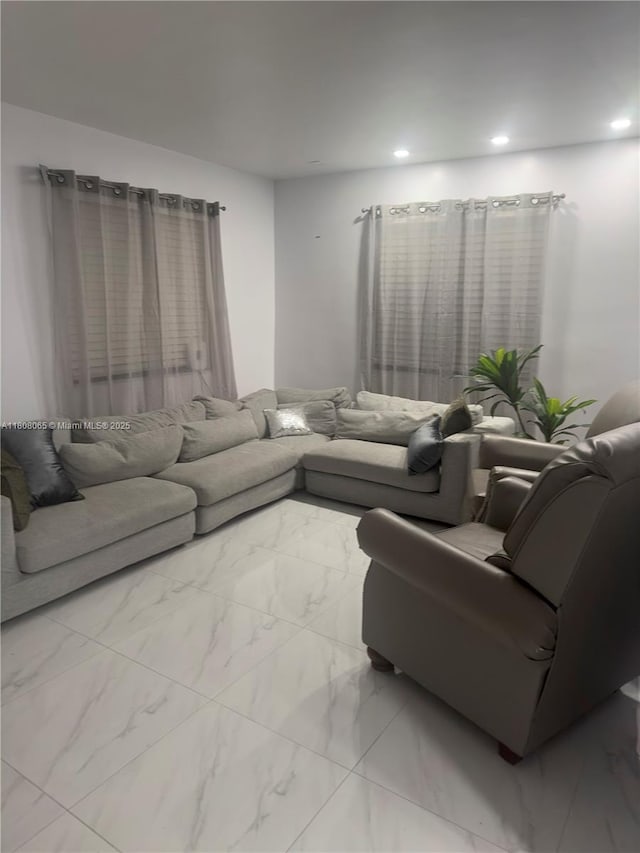 650 E 55th St, Hialeah, FL 33013 - living area featuring marble finish floors and recessed lighting