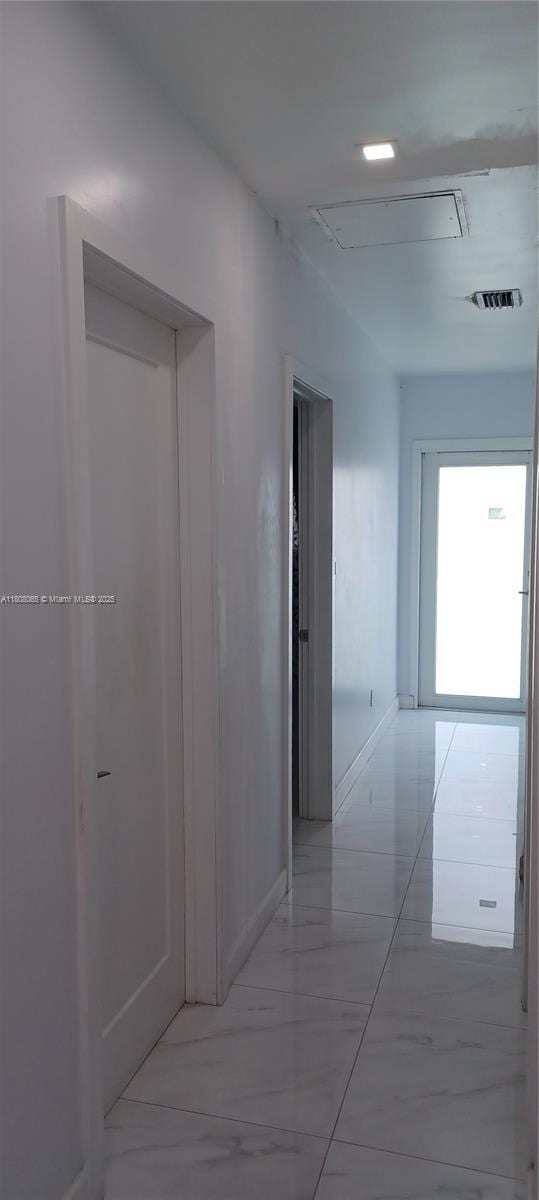 650 E 55th St, Hialeah, FL 33013 - hall with baseboards
