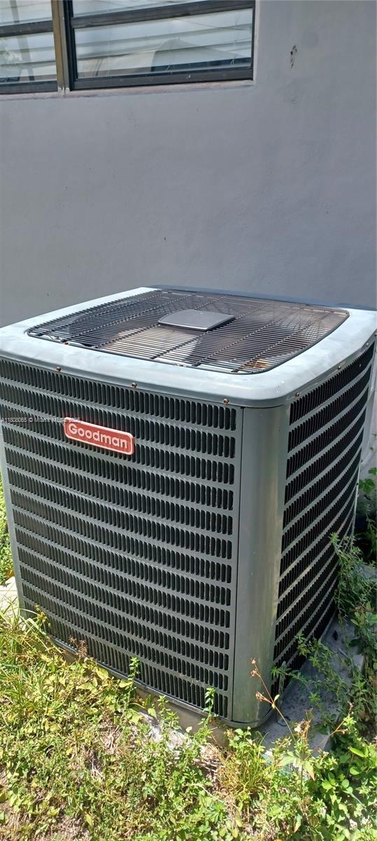 650 E 55th St, Hialeah, FL 33013 - exterior view of a central AC unit