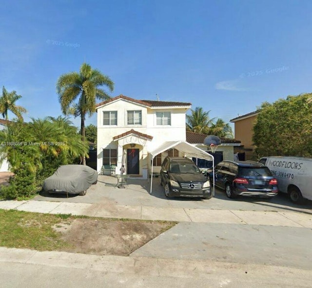 17401 SW 137th Ct, Miami, FL 33177 - traditional home with a carport and stucco siding