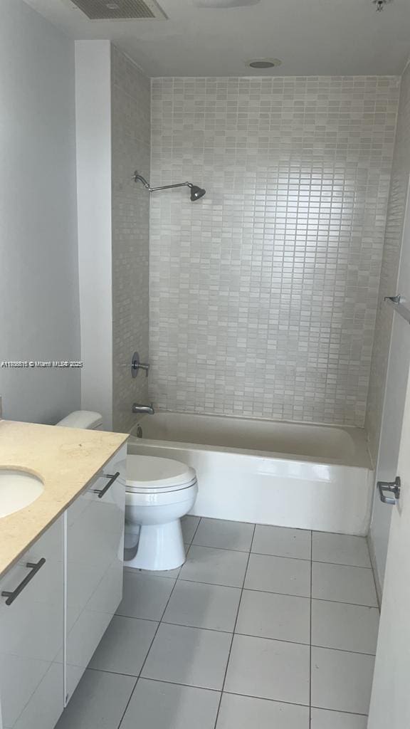 3470 E Coast Ave Unit H2003, Miami, FL 33137 - bathroom featuring tile patterned flooring, vanity, toilet, and washtub / shower combination