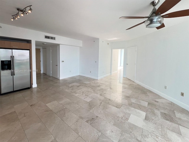 350 S Miami Ave Unit 3013, Miami, FL 33130 - empty room featuring a ceiling fan and baseboards