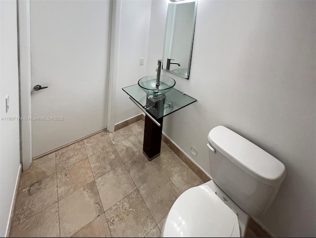 350 S Miami Ave Unit 3013, Miami, FL 33130 - half bathroom with toilet and a sink