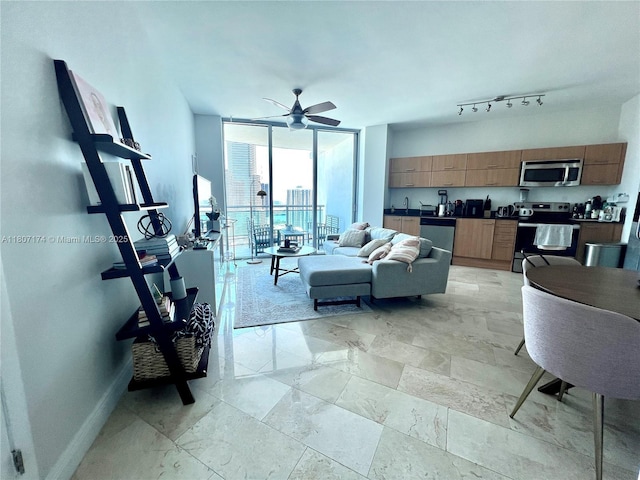 350 S Miami Ave Unit 3013, Miami, FL 33130 - living area featuring floor to ceiling windows and ceiling fan