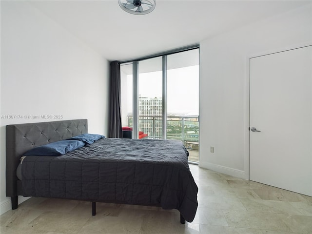 350 S Miami Ave Unit 3013, Miami, FL 33130 - bedroom featuring expansive windows and access to outside