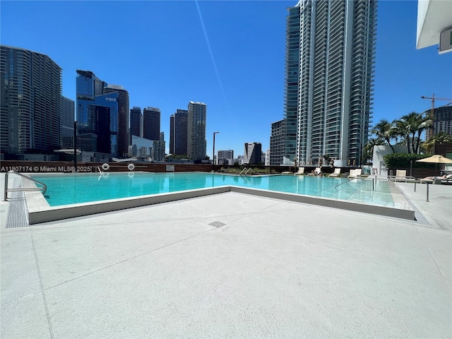 350 S Miami Ave Unit 3013, Miami, FL 33130 - community pool with a patio and a city view