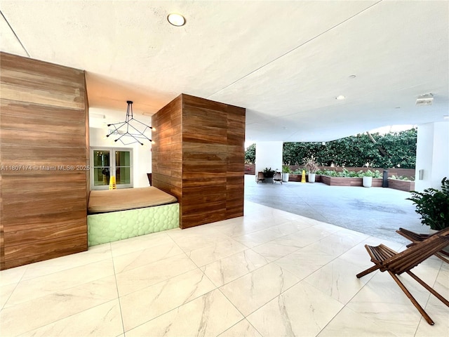 350 S Miami Ave Unit 3013, Miami, FL 33130 - hall with a chandelier and marble look tile flooring