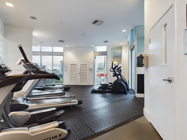 350 S Miami Ave Unit 3013, Miami, FL 33130 - exercise room with expansive windows and recessed lighting