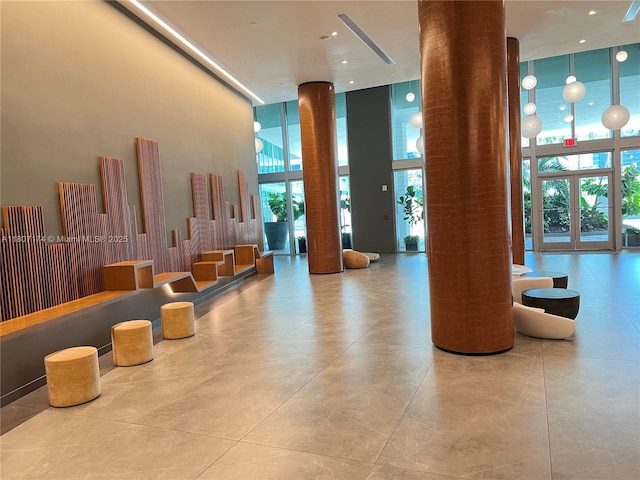 350 S Miami Ave Unit 3013, Miami, FL 33130 - common area featuring expansive windows and a high ceiling