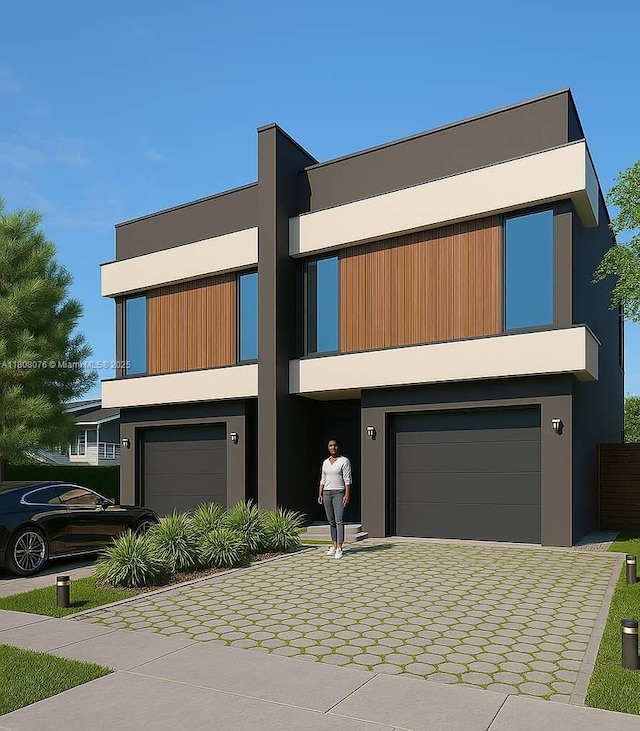 1153 SW 22nd Ter, Miami, FL 33129 - contemporary home with a garage, stucco siding, and driveway