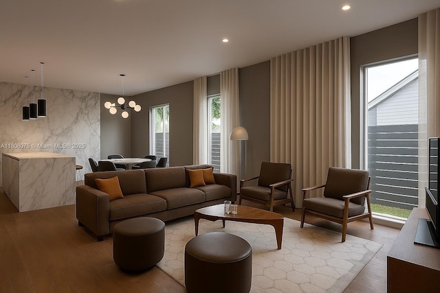 1153 SW 22nd Ter, Miami, FL 33129 - living room featuring light wood finished floors, recessed lighting, and an accent wall