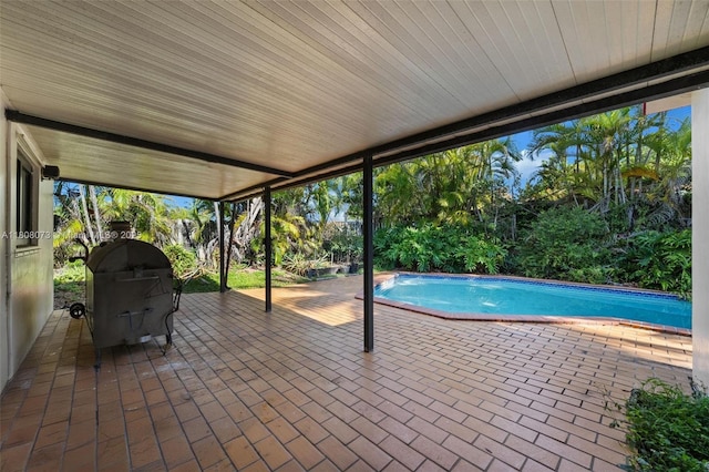 9155 SW 179th St, Palmetto Bay, FL 33157 - view of patio featuring grilling area and an outdoor pool
