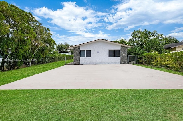 6121 SW 40th Ct, Miramar, FL 33023 - back of house featuring stone siding, a patio, and stucco siding