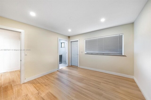 6121 SW 40th Ct, Miramar, FL 33023 - empty room with light wood-style floors, baseboards, and recessed lighting