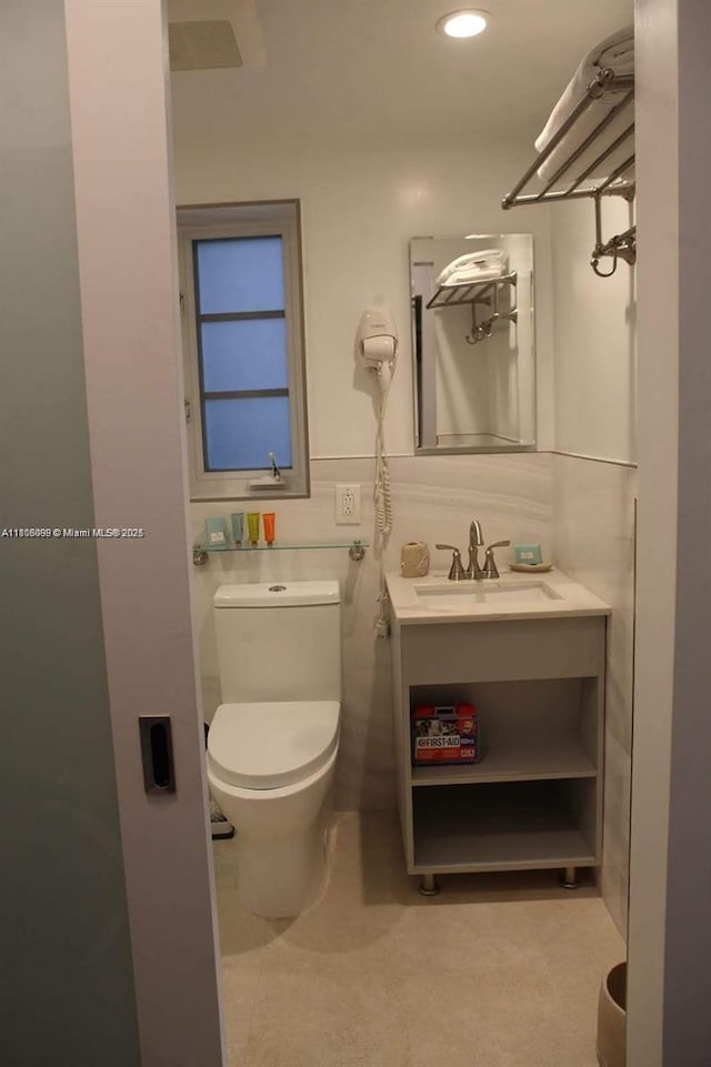 763 Pennsylvania Ave Unit 101, Miami Beach, FL 33139 - half bathroom with vanity, toilet, and recessed lighting