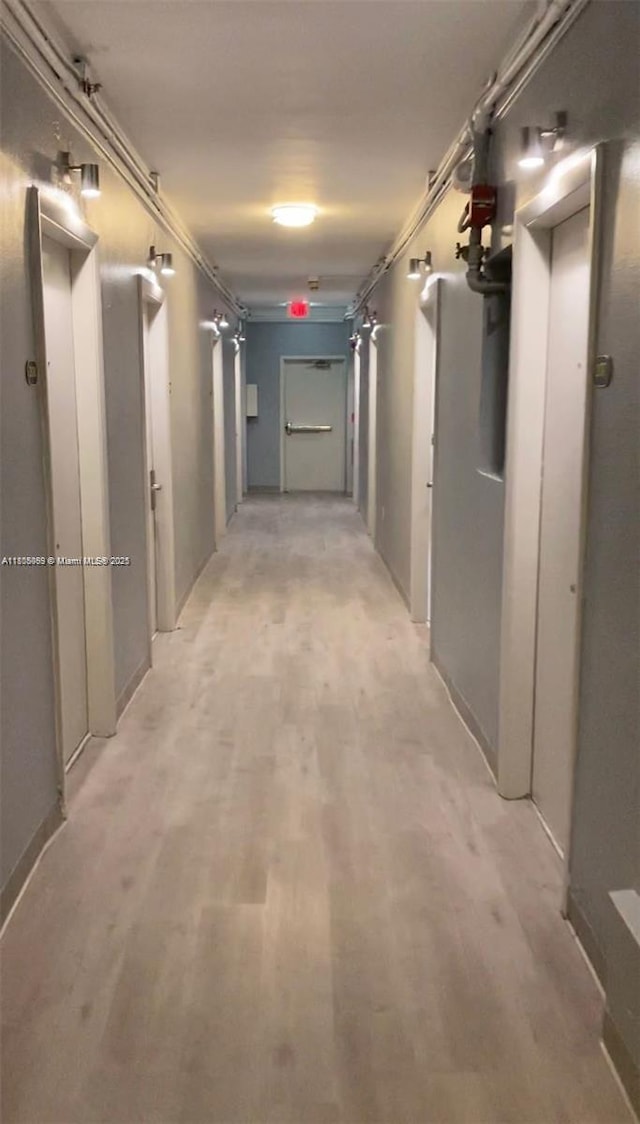 763 Pennsylvania Ave Unit 101, Miami Beach, FL 33139 - corridor featuring light wood-style flooring