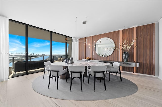 1000 Biscayne Blvd Unit 3201, Miami, FL 33132 - dining area with expansive windows and wooden walls