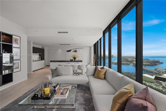 1000 Biscayne Blvd Unit 3201, Miami, FL 33132 - living room with a water view and light wood-style flooring