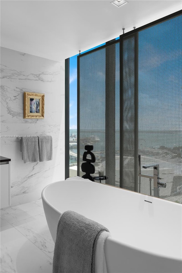 1000 Biscayne Blvd Unit 3201, Miami, FL 33132 - bedroom featuring marble finish flooring and floor to ceiling windows
