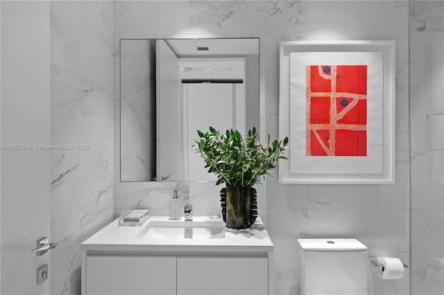 1000 Biscayne Blvd Unit 3201, Miami, FL 33132 - bathroom with tile walls, vanity, and toilet