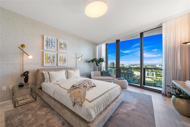 1000 Biscayne Blvd Unit 3201, Miami, FL 33132 - bedroom with floor to ceiling windows and wood finished floors