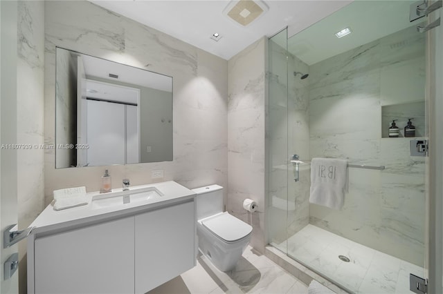 1000 Biscayne Blvd Unit 3201, Miami, FL 33132 - bathroom with marble finish flooring, vanity, a marble finish shower, tile walls, and toilet