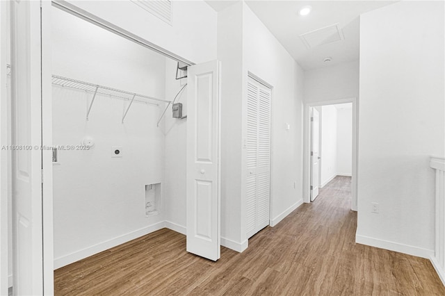 22519 SW 125th Ave Unit B, Miami, FL 33170 - washroom featuring electric dryer hookup, wood finished floors, and baseboards