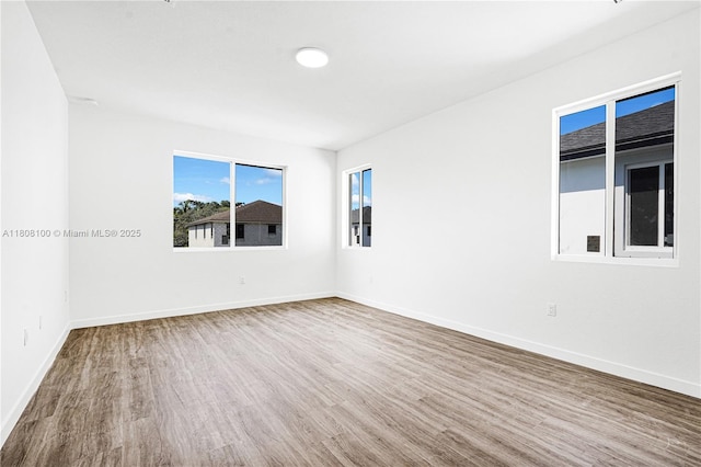 22519 SW 125th Ave Unit B, Miami, FL 33170 - unfurnished room with wood finished floors and baseboards